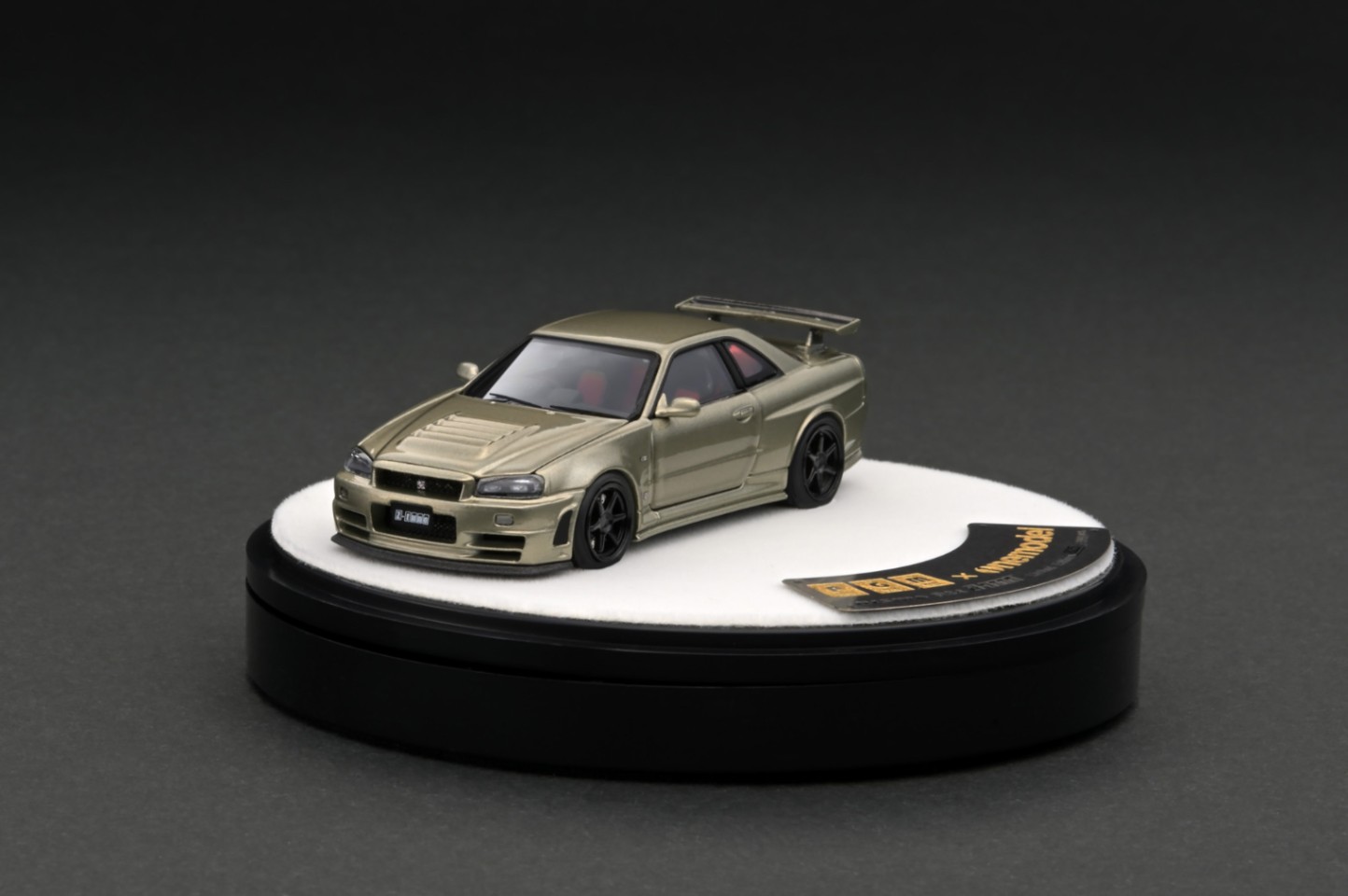 PGM-641001-2 PGM 1/64 Nismo R34 GT-R Z-tune Jade Green With Engine Rotating display